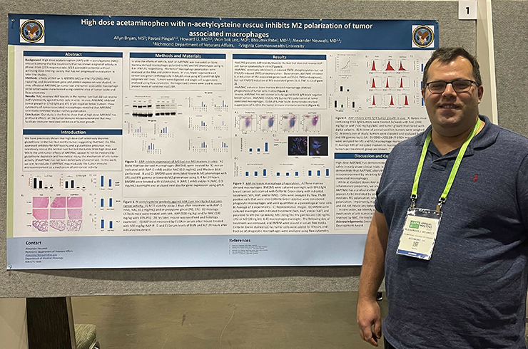 Neuwelt pictured at AACR poster session