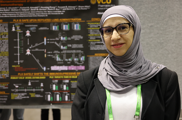 Sunbul pictured at AACR poster session