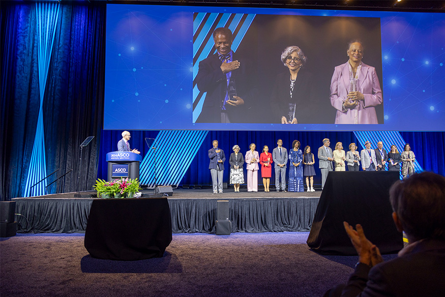 Massey director Robert A. Winn, M.D. receiving the American Society of Cancer Oncology (ASCO) Allen Lichter Visionary Leader Award during the ASCO Annual Meeting in Chicago on June 1