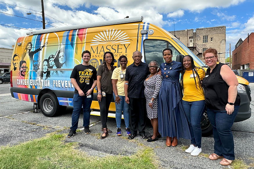 Massey on the Move van with group photo