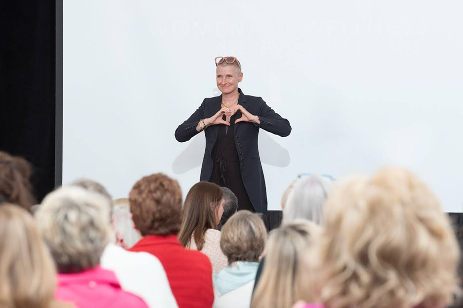 Elizabeth Gilbert speaking at the 2024 Women and Wellness luncheon